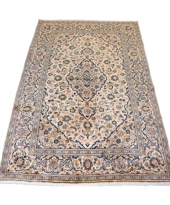 Lot 255 - A Kashan carpet