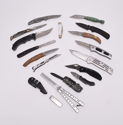 Lot 216 - A group of assorted folding knives and...