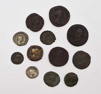 Lot 252 - A small assortment of Roman silver and bronze coinage comprising