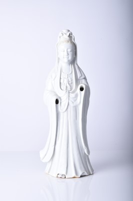 Lot 34 - A Chinese blanc de chine figure of Guanyin, Qing Dynasty
