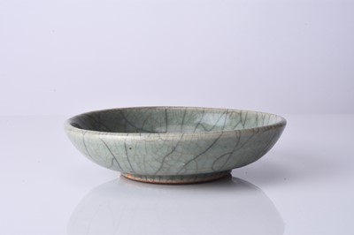Lot 35 - A small Guan type dish, Qing Dynasty