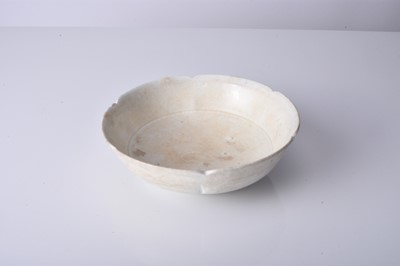 Lot 16 - A Chinese ding ware lotus bowl, Song Dynasty