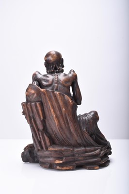 Lot 132 - Three Chinese carved wood figures of Luohan, Qing Dynasty