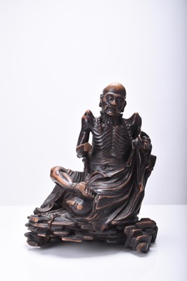 Lot 132 - Three Chinese carved wood figures of Luohan, Qing Dynasty