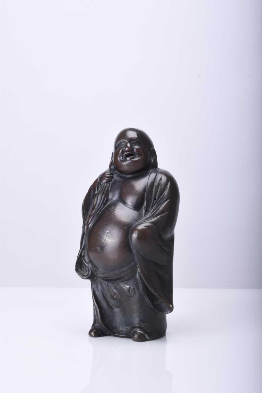 Lot 232 - A Japanese bronze figure of Hotei, Meiji era