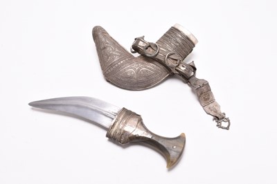 Lot 225 - An Omani ceremonial khanjar dagger in scabbard, with belt