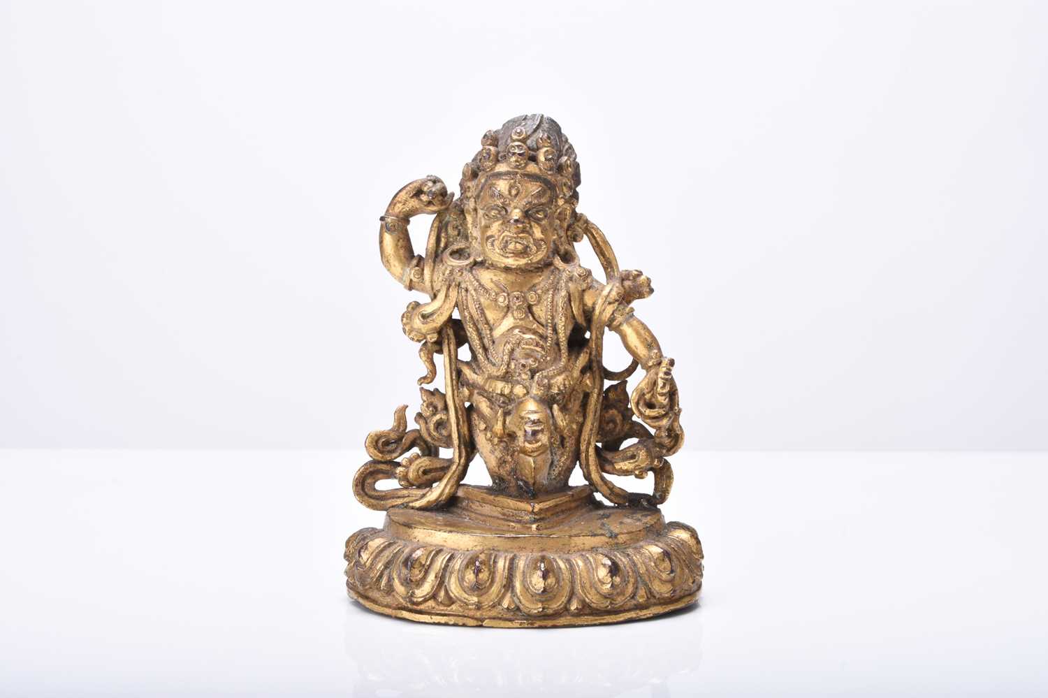 Lot 290 - A Tibetan gilt bronze figure of Padmasambhava, 18th/19th century