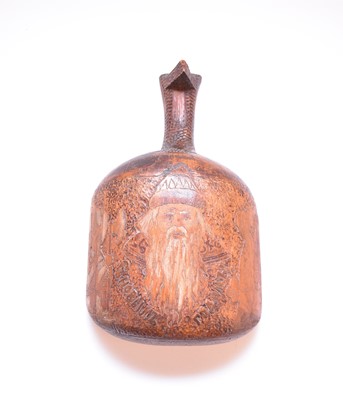 Lot 543 - A Russian carved wooden ladle, carved with detail celebrating New Year