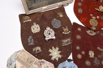 Lot 199 - A group of badges and buttons including interesting British Indian Army examples, late 19th century