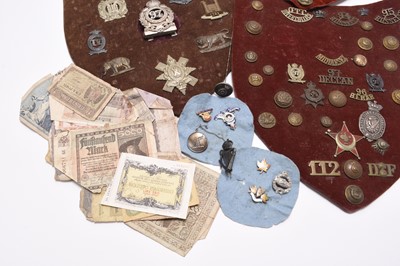 Lot 199 - A group of badges and buttons including interesting British Indian Army examples, late 19th century