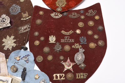 Lot 199 - A group of badges and buttons including interesting British Indian Army examples, late 19th century