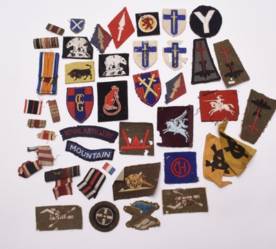 Lot 76 - Military cloth insignia including formation badges