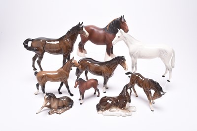 Lot 126 - A group of horses including Beswick huntsmen, Hackney pony and a Shire Horse