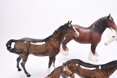 Lot 126 - A group of horses including Beswick huntsmen, Hackney pony and a Shire Horse