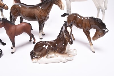 Lot 126 - A group of horses including Beswick huntsmen, Hackney pony and a Shire Horse