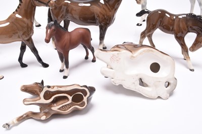 Lot 126 - A group of horses including Beswick huntsmen, Hackney pony and a Shire Horse