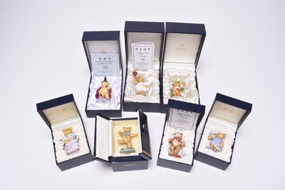 Lot 129 - Twenty Halcyon Days porcelain teddy models, with related book and matchbox holder