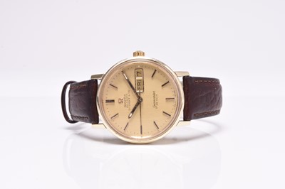 Lot 492 - Omega: A gentlemans's gold Seamaster De Ville Tiffany automatic wristwatch