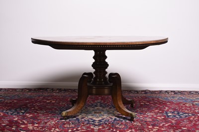 Lot 236 - A 19th century rosewood tilt-top centre table