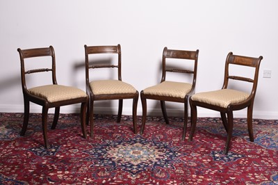 Lot 231 - A harlequin set of eight Regency mahogany rope-back dining chairs