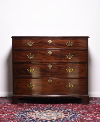 Lot 233 - A George III mahogany bow-front chest of drawers