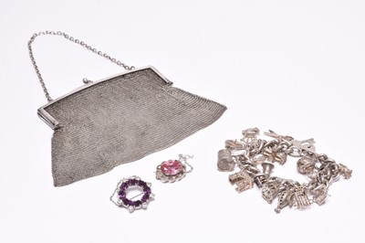 Lot 172 - A silver mesh purse, together with a silver charm bracelet and two brooches