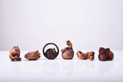 Lot 231 - A group of six Japanese carved wood netsuke modelled as rats, 20th century