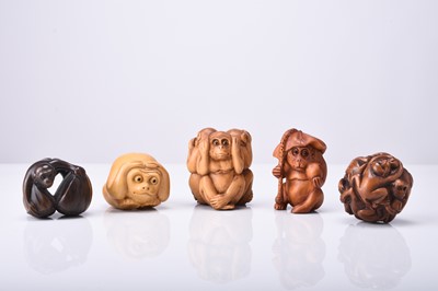 Lot 221 - An assembled group of five Japanese wood netsuke, 20th century