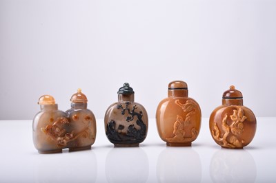 Lot 135 - Four Chinese carved agate snuff bottles, 19th century