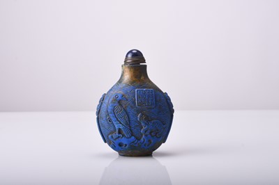 Lot 150 - A Chinese carved lapis lazuli snuff bottle, 19th century