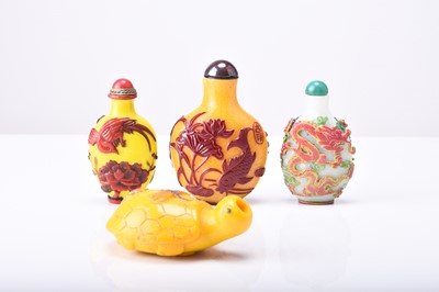 Lot 157 - A group of four Chinese overlay glass snuff bottles, 19th/20th century