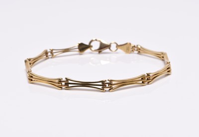 Lot 343 - A 9ct gold three bar link bracelet