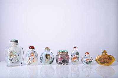 Lot 168 - A group of seven Chinese internally painted glass snuff bottles, 20th century