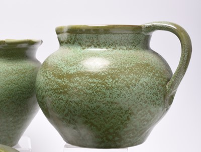 Lot 52 - A collection of C H Brannam (Barnstaple) matt green glazed art pottery