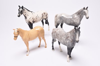 Lot 128 - Three Beswick and one Royal Doulton horses