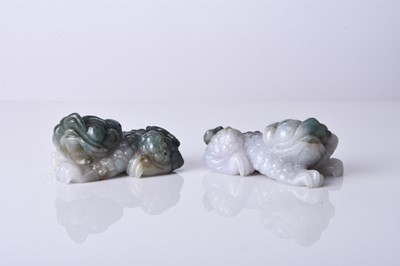 Lot 161 - A pair of Chinese jadeite figures of lion dogs, 20th century