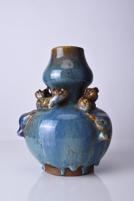 Lot 40 - A Chinese relief moulded flambe vase, early 20th century