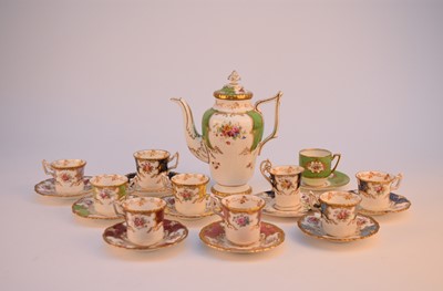 Lot 67 - A Coalport harlequin batwing demitasse service