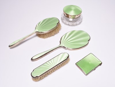 Lot 74 - A five piece silver and green enamel mounted dressing table set