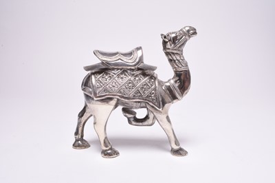 Lot 125 - A white metal model of a camel