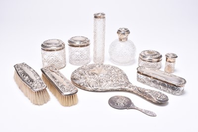 Lot 49 - A collection of silver mounted dressing table wares