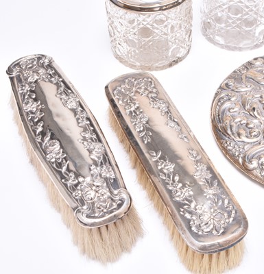 Lot 49 - A collection of silver mounted dressing table wares