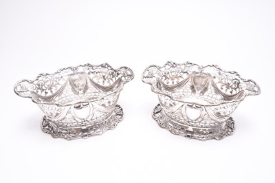Lot 55 - A pair of Edwardian oval pierced silver bowls