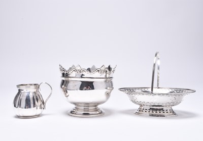 Lot 48 - A silver basket, cream jug and bowl