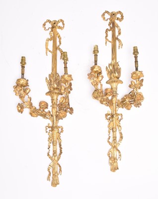 Lot 190 - A pair of Rococo revival gilt metal wall sconces