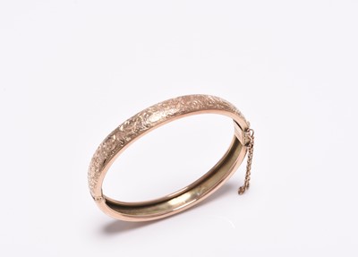 Lot 253 - A 9ct gold bangle