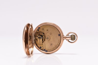 Lot 88 - Waltham: A gold hunter pocket watch with gold Albert chain