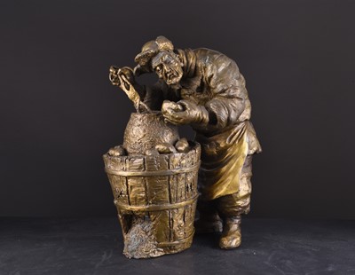 Lot 71 - A Chinese bronze alloy figure of a potato vendor, contemporary