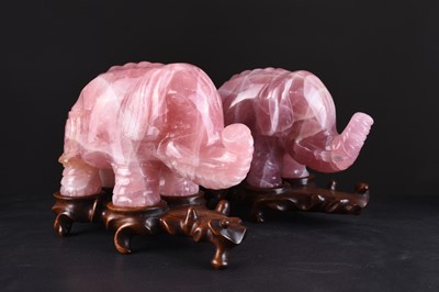 Lot 149 - A pair of Chinese rose quartz figures of elephants