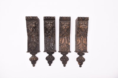 Lot 193 - A set of four carved oak corbels